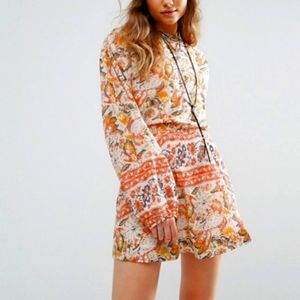 Free People Silver Sun print mini dress with cut out back